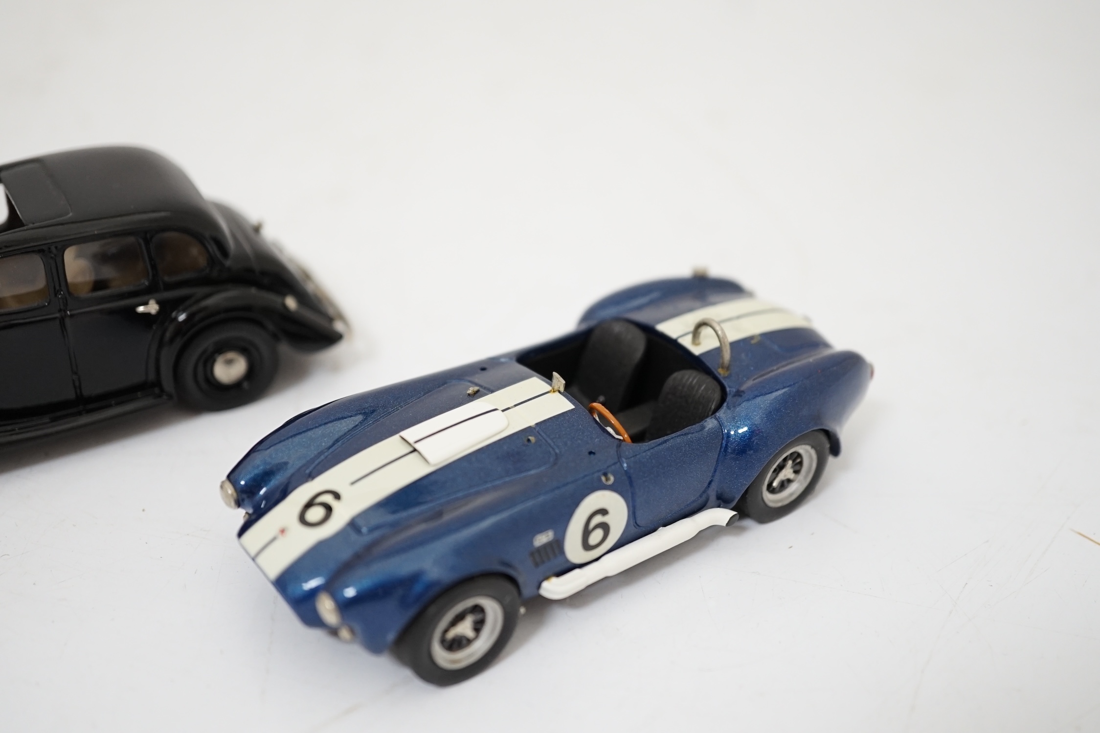 Twenty boxed diecast, white metal, etc. model vehicles including; a Lansdowne Models MG Saloon Type ‘YA’, and an unboxed S.M.T.S. white metal A.C. cobra, two Scalextric cars; a Bentley (C305) and an Alfa-Romeo (C306), th